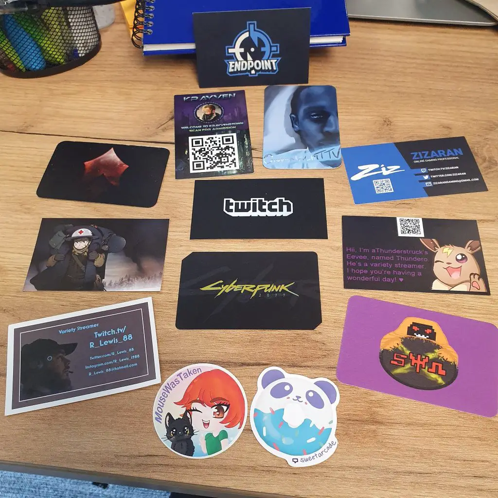 Assortment of streamer business cards collected by Indeedee